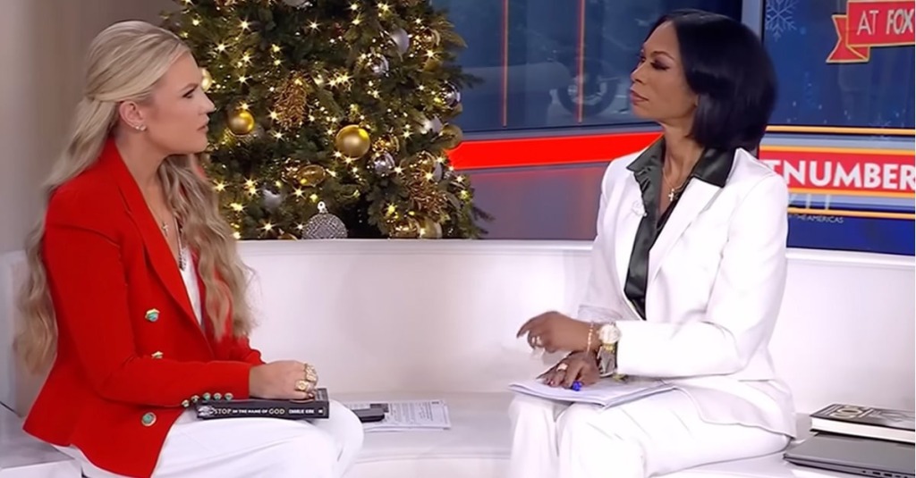 Erika Kirk speaks with Fox News anchor Harris Faulkner while holding her late husband's new book, "Stop, in the Name of God."